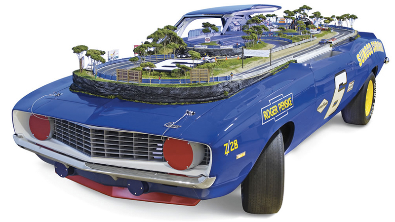 Illustration for article titled A 1969 Camaro Z/28 Reborn as an Incredibly Detailed Slot Car Track